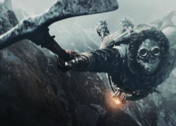 An ice climber desperately clings to his ice pick while making his way to the city in Frostpunk